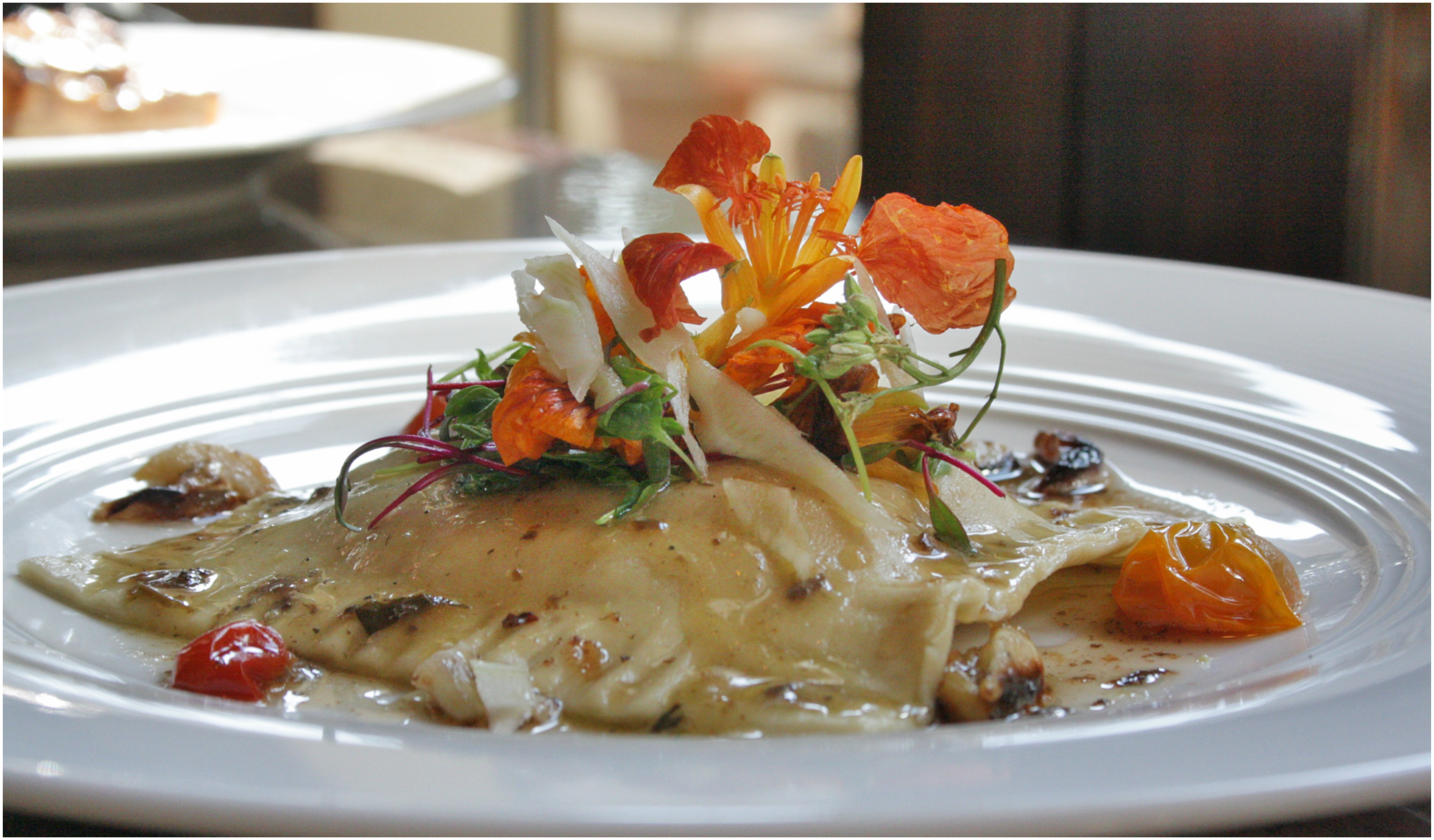 prawn-raviolo-with-soft-egg-yolk-truffle-shavings-and-lemon-cherry-tomato-butter-bellydriven-pune